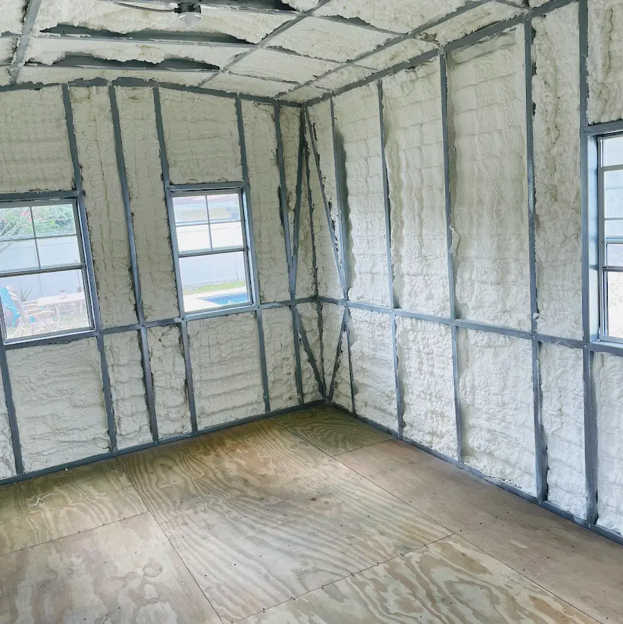 Closed-cell spray foam insulation applied to wall cavities in a residential project in Gorham